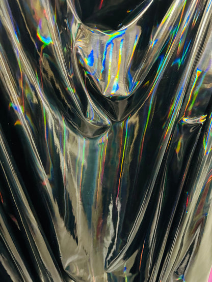 New lacer iridescent black vinyl 4-way stretch 58/60” Sold by the YD. Ships worldwide from Los Angeles California USA