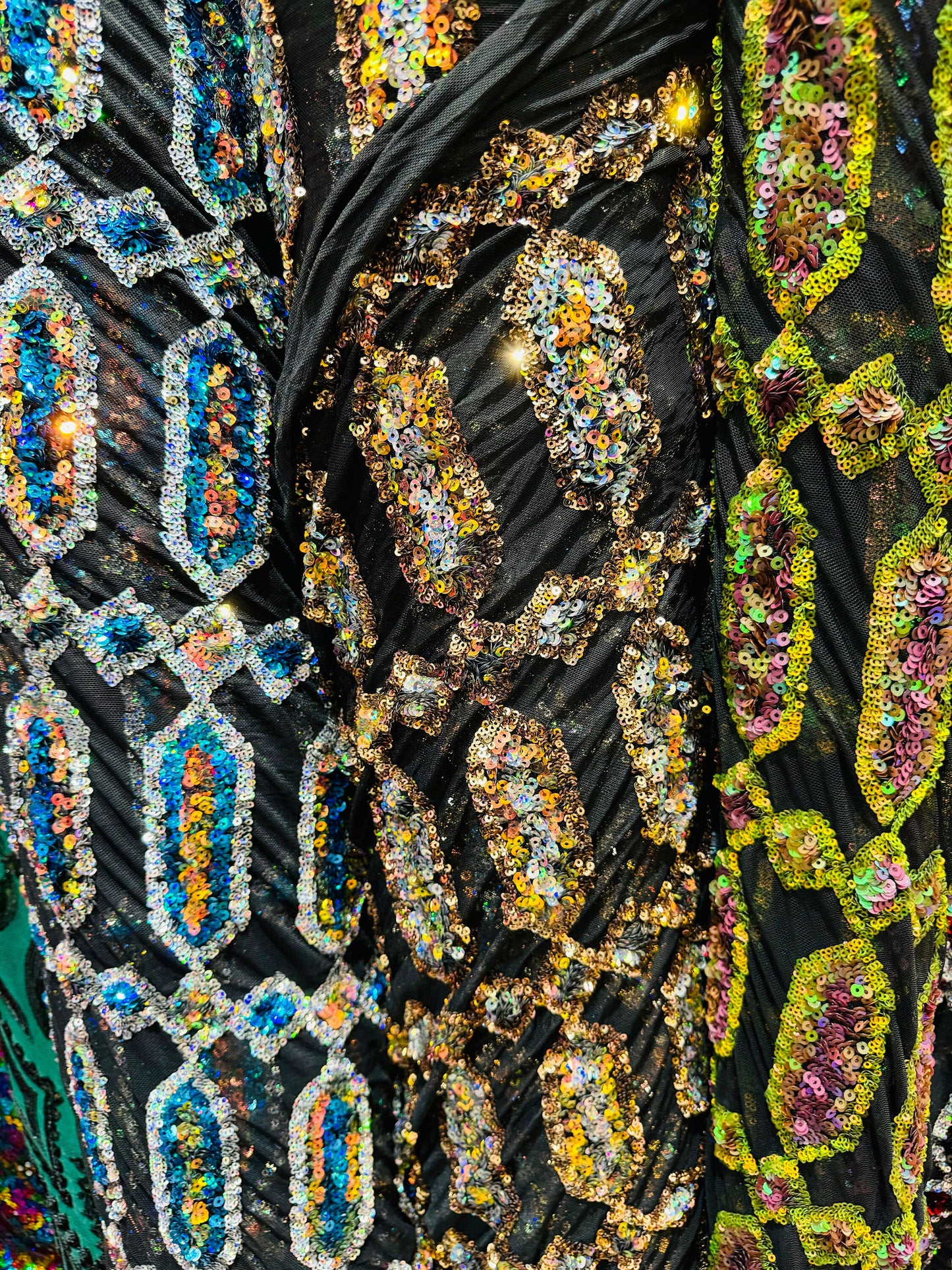 Luxury Geometric Avatar iridescent sequins on stretch power mesh 4-way  50/52” Sold by the YD. Ships worldwide from Los Angeles California