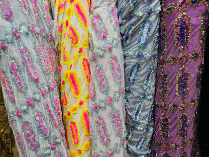 Luxury Geometric Avatar iridescent sequins on stretch power mesh 4-way  50/52” Sold by the YD. Ships worldwide from Los Angeles California
