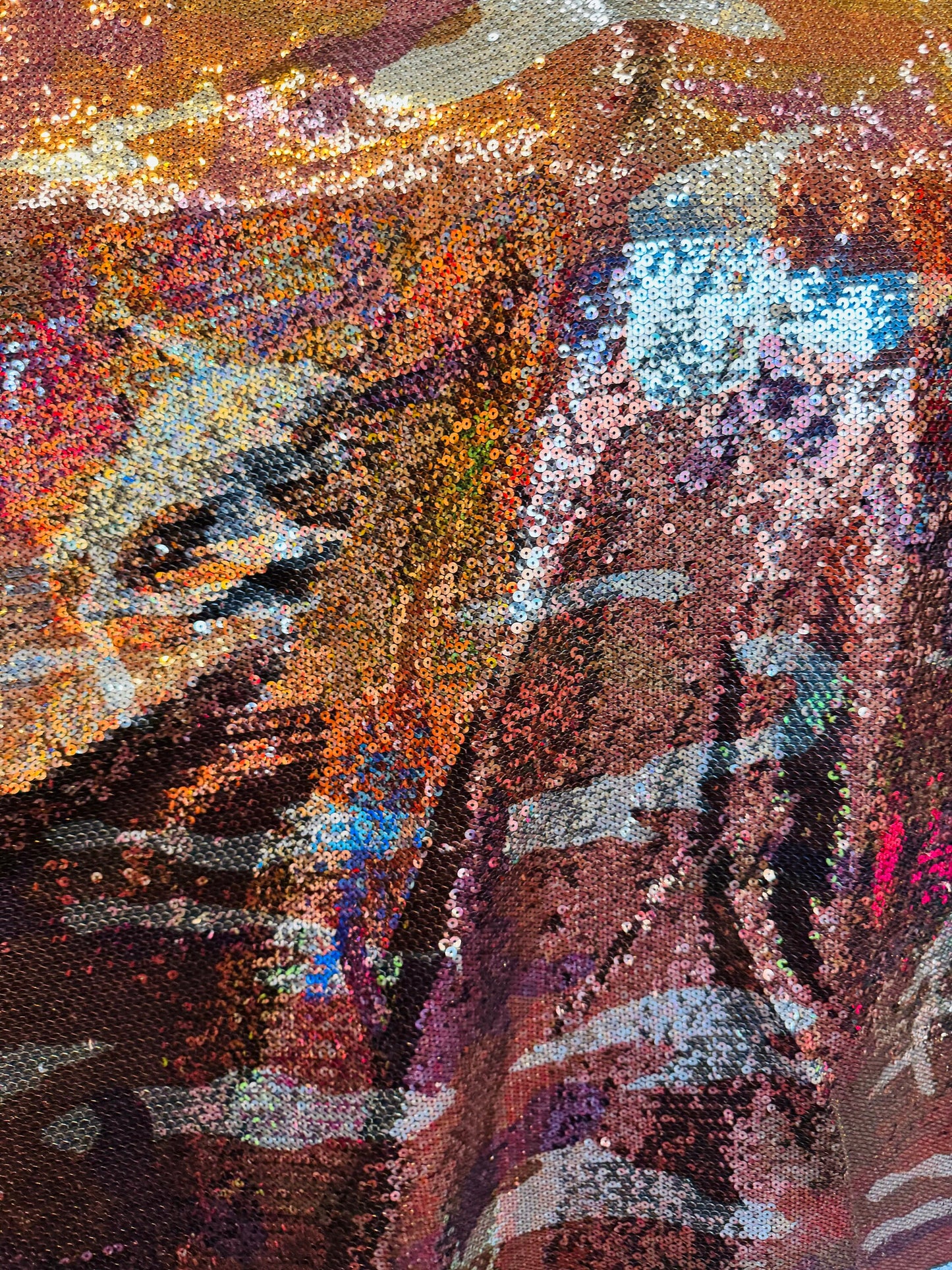 New camouflage design on spandex sequins 2-way stretch 55/57” Sold by the YD.