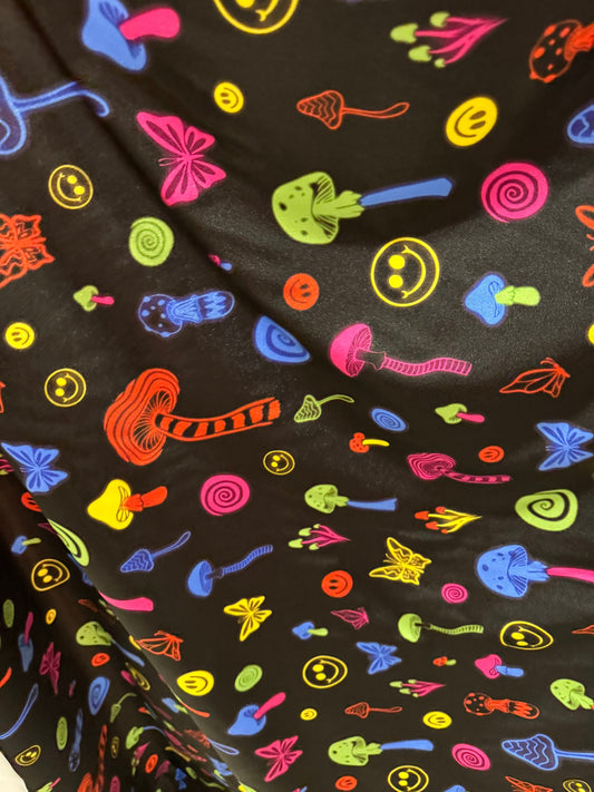 Fantastic mushrooms design black/multicolor print on great quality of nylon spandex 4-way stretch 58/60”