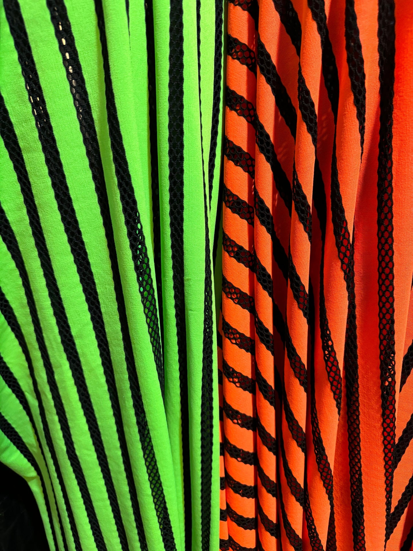 New stripes design nylon spandex with mesh stripes 4-way stretch 58-60” sold by the YD. Ships worldwide from Los Angeles California USA.