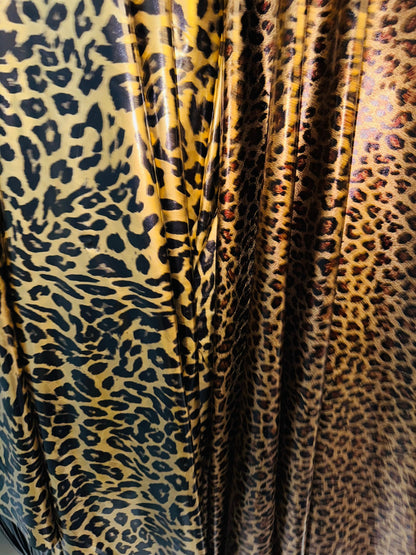 Exotic animal print on stretch vinyl with foil 4-way stretch 58/60” Sold by the YD. Ships worldwide from Los Angeles California USA