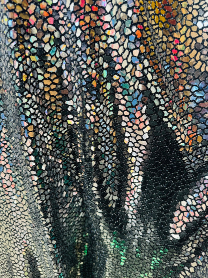 New Dragon and spectrum sequins on metallic spandex 4-way stretch 58/60” Sold by the YD. Ships Worldwide from Los Angeles California USA.