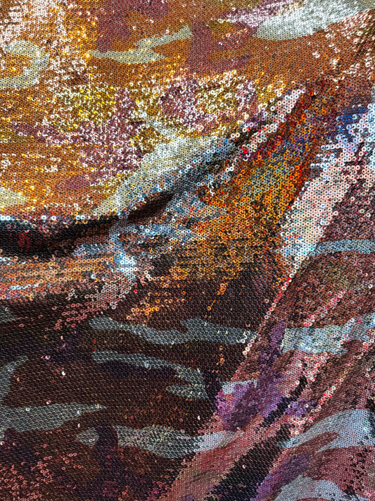 New camouflage design on spandex sequins 2-way stretch 55/57” Sold by the YD.