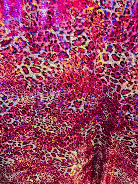 New Wild Leopard design on Hologram metallic nylon spandex 4-way stretch 58/60” Sold by the YD. Ships worldwide from Los Angeles CA