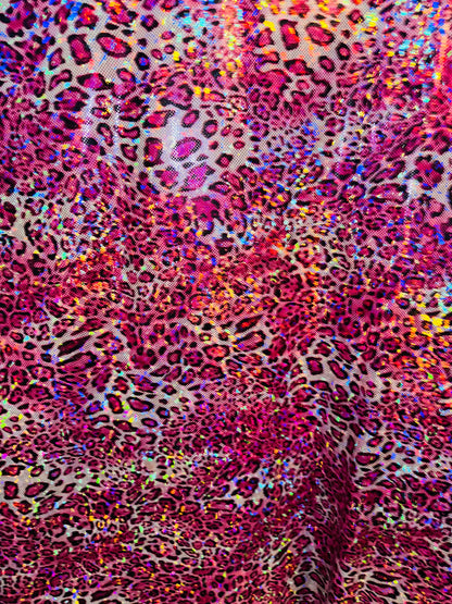 New Wild Leopard design on Hologram metallic nylon spandex 4-way stretch 58/60” Sold by the YD. Ships worldwide from Los Angeles CA