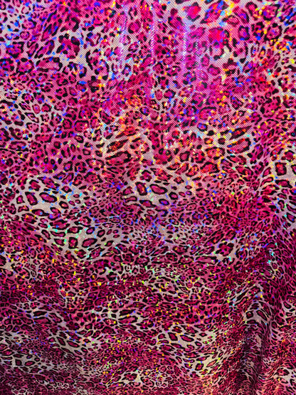 New Wild Leopard design on Hologram metallic nylon spandex 4-way stretch 58/60” Sold by the YD. Ships worldwide from Los Angeles CA