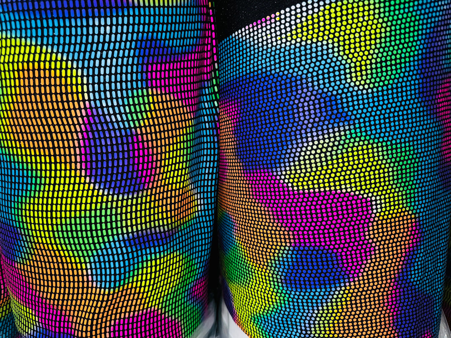 Chameleon sequins design with neon colors it glows under black light metallic nylon spandex 2-way stretch 58/60”