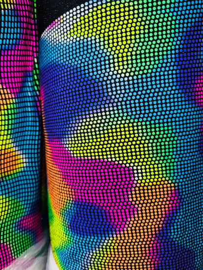 Chameleon sequins design with neon colors it glows under black light metallic nylon spandex 2-way stretch 58/60”