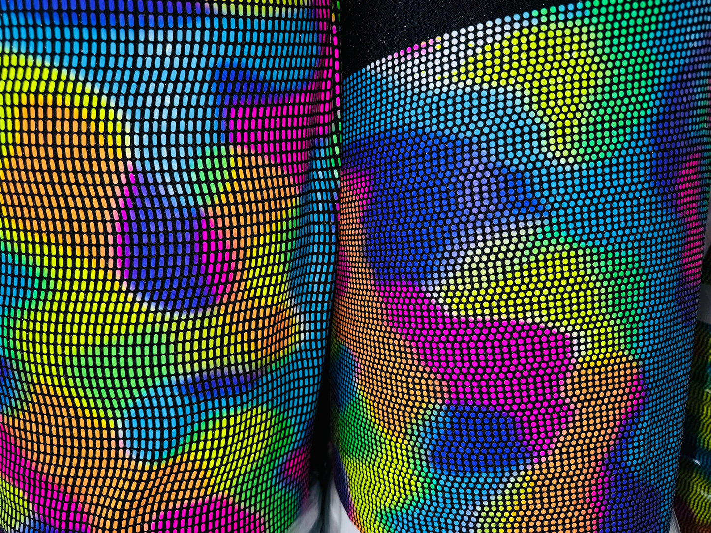 Chameleon sequins design with neon colors it glows under black light metallic nylon spandex 2-way stretch 58/60”