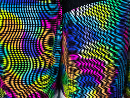 Chameleon sequins design with neon colors it glows under black light metallic nylon spandex 2-way stretch 58/60”