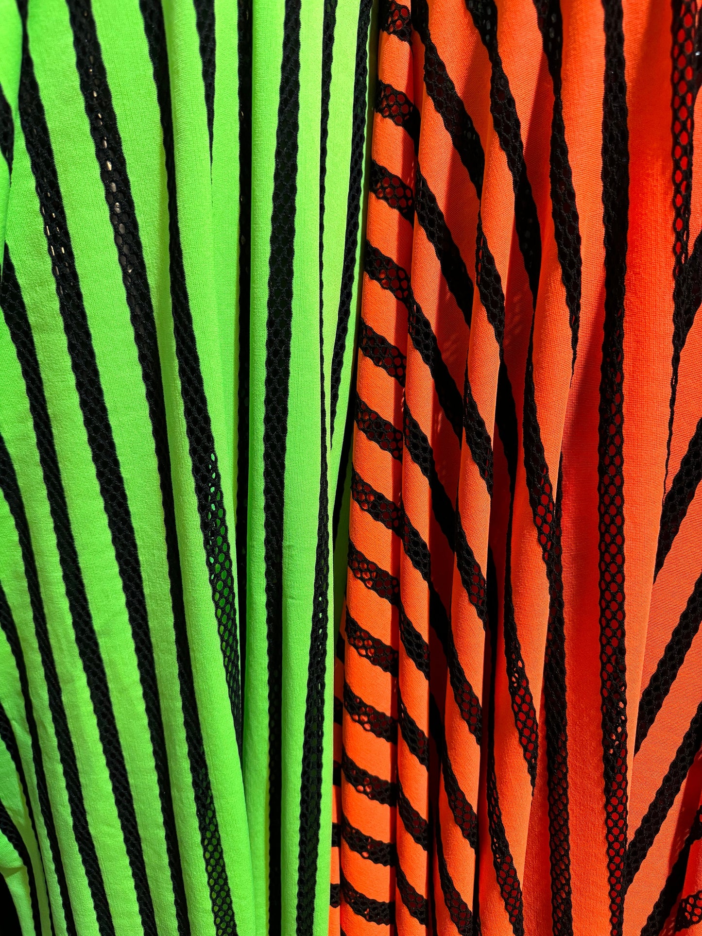 New stripes design nylon spandex with mesh stripes 4-way stretch 58-60” sold by the YD. Ships worldwide from Los Angeles California USA.