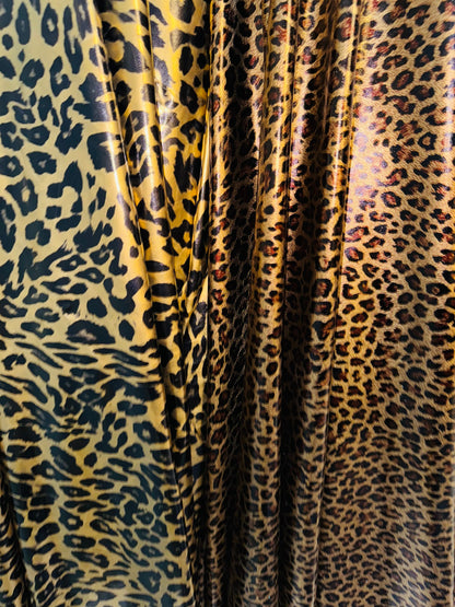 Exotic animal print on stretch vinyl with foil 4-way stretch 58/60” Sold by the YD. Ships worldwide from Los Angeles California USA