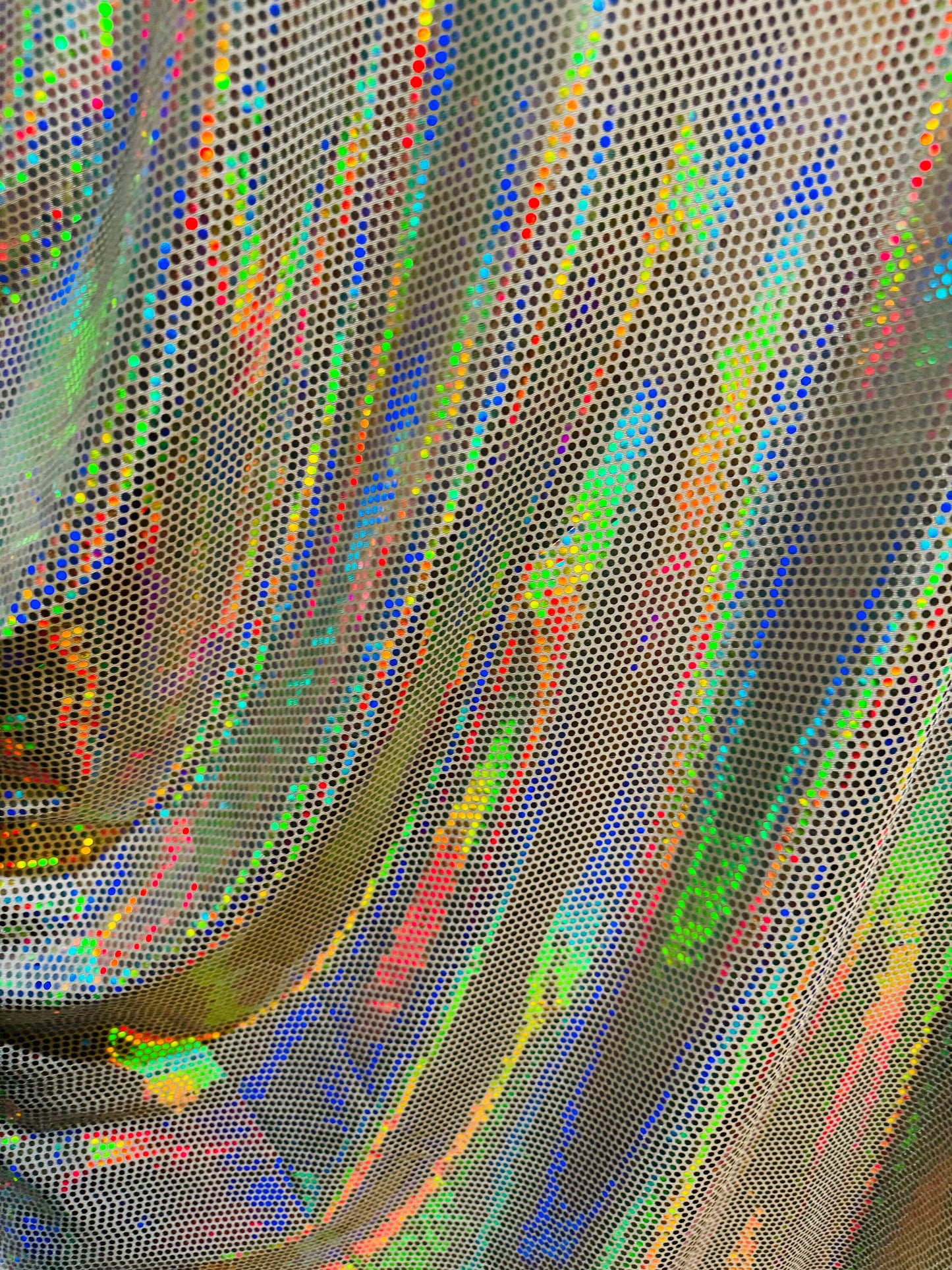 Spectrum disco sequins Iridescent silver on poly spandex 2-way stretch 58/60”
