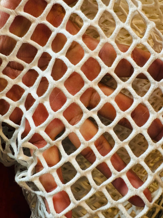 New Fishnet jumbo size white and black  spandex mesh 4-way 58/60” Sold by the YD. Ships worldwide from Los Angeles California USA.