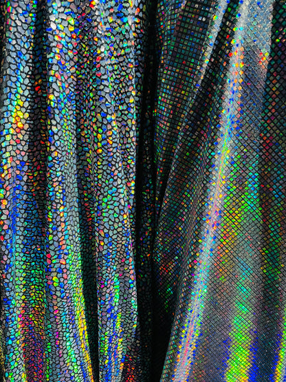 New Dragon and spectrum sequins on metallic spandex 4-way stretch 58/60” Sold by the YD. Ships Worldwide from Los Angeles California USA.