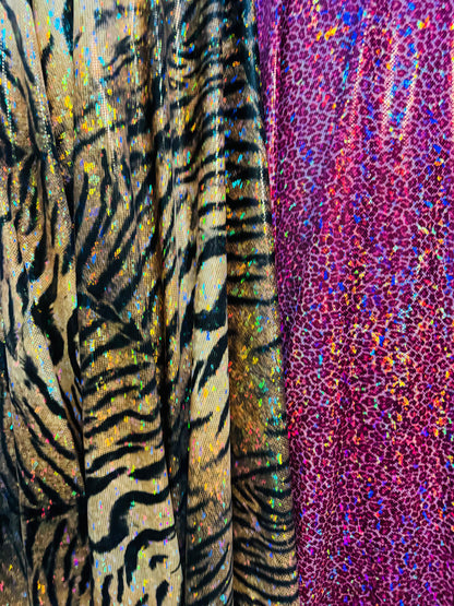 Exotic Multi Animal prints on hologram metallic shatter glass nylon spandex 4-way stretch 58/60” High quality fabrics by AlexLAFabrics