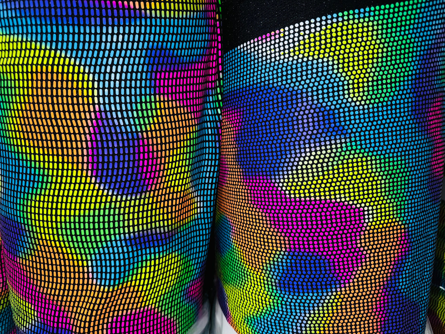 Chameleon sequins design with neon colors it glows under black light metallic nylon spandex 2-way stretch 58/60”