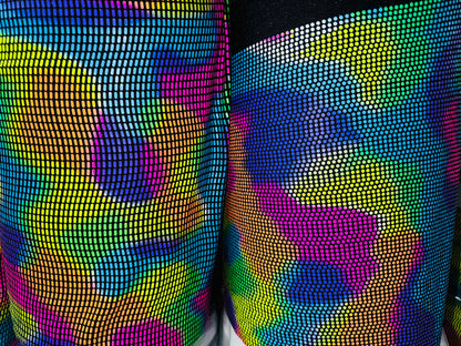 Chameleon sequins design with neon colors it glows under black light metallic nylon spandex 2-way stretch 58/60”