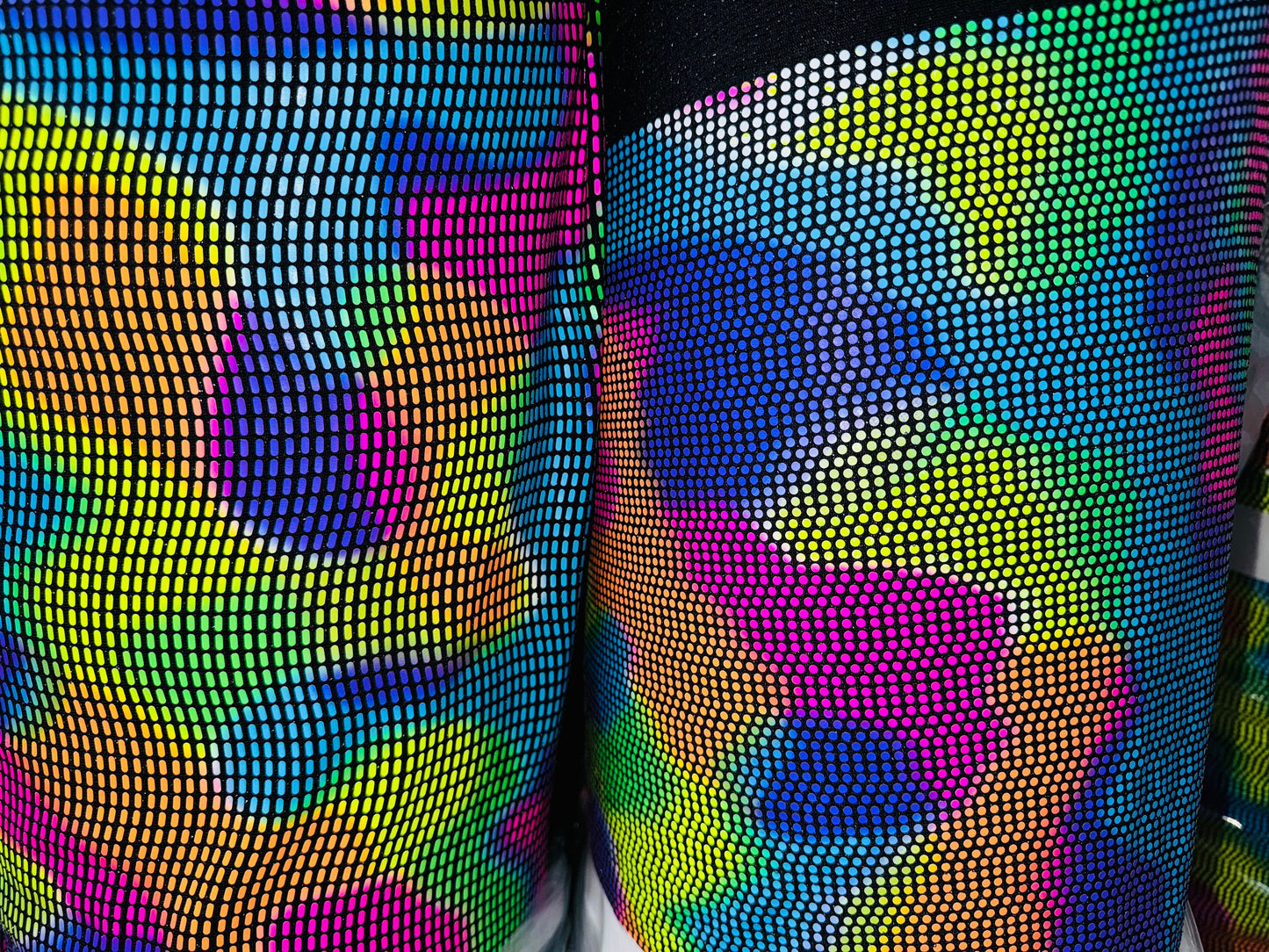 Chameleon sequins design with neon colors it glows under black light metallic nylon spandex 2-way stretch 58/60”