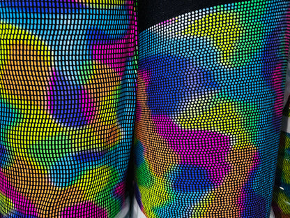 Chameleon sequins design with neon colors it glows under black light metallic nylon spandex 2-way stretch 58/60”