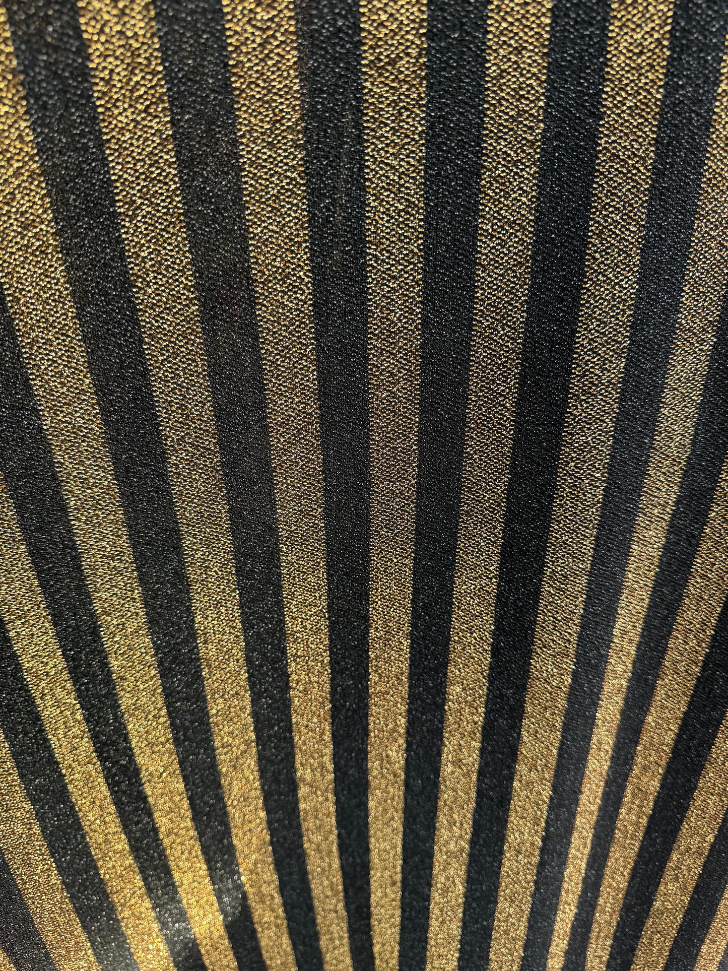 New metallic stripes design black/gold 2-way stretch 58/60” Sold by the YD.