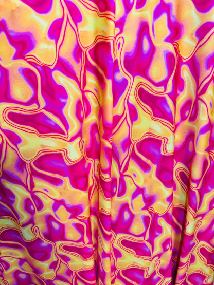 New Lava design Magenta yellow print on great quality of poly spandex 4-way stretch 58/60”