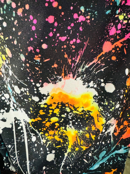 Luxury splatter paint design Black/Multicolor print on nylon spandex 4-way stretch 58/60” Sold by the YD. Ships worldwide