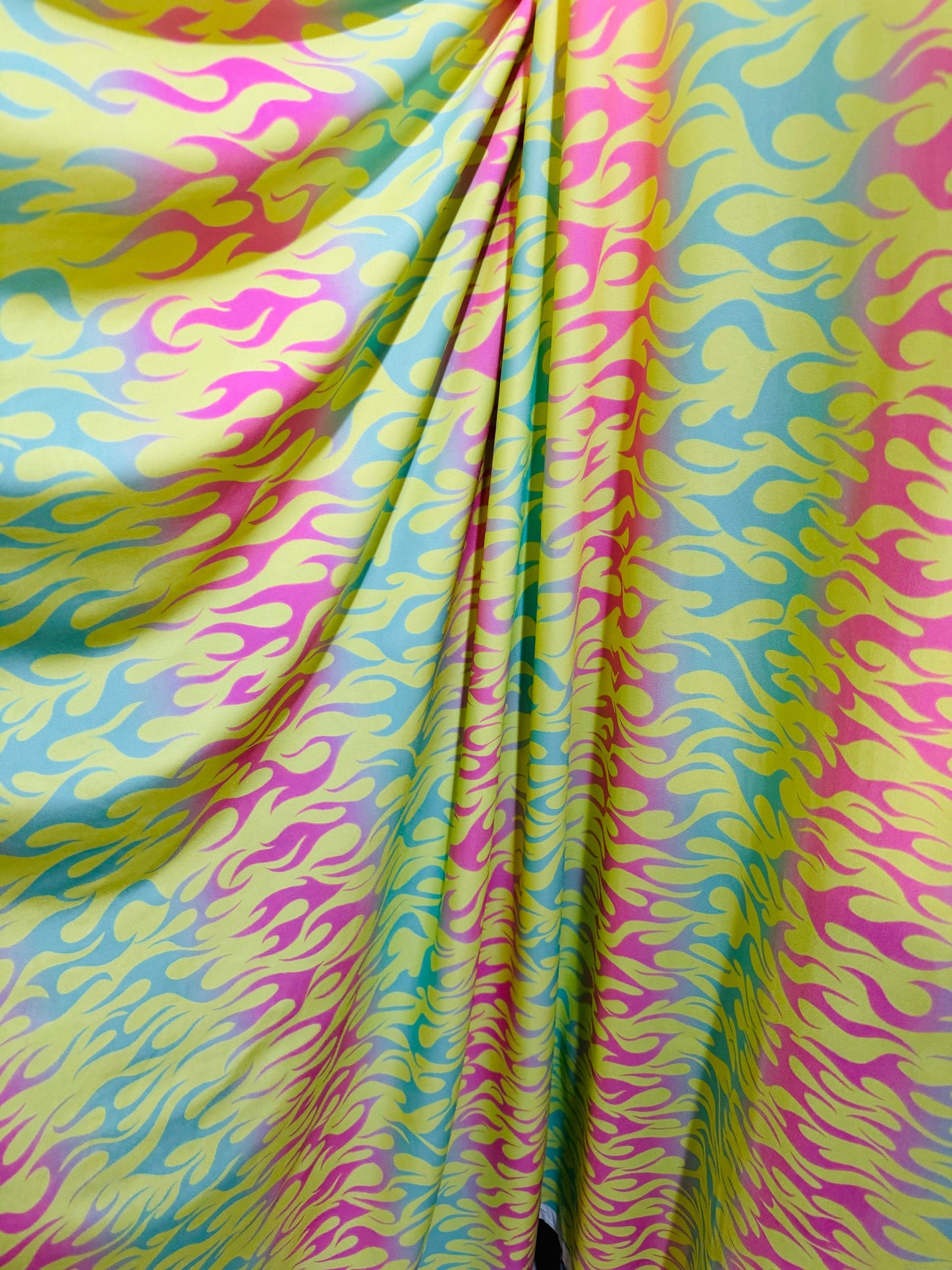 New Flames design Multi Pastel colors print on great quality of poly spandex 4-way stretch 58/60”