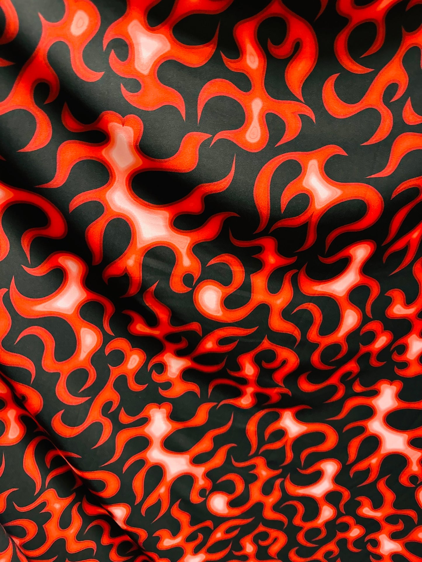 New Flames abstract design Black/Red print on great quality of nylon spandex 4-way stretch 58/60”