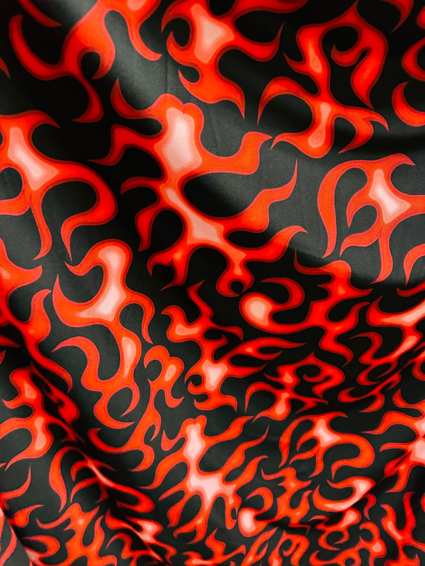 New Flames abstract design Black/Red print on great quality of nylon spandex 4-way stretch 58/60”