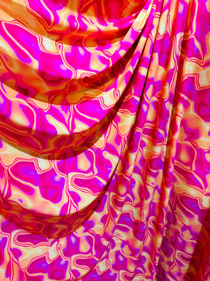 New Lava design Magenta yellow print on great quality of poly spandex 4-way stretch 58/60”