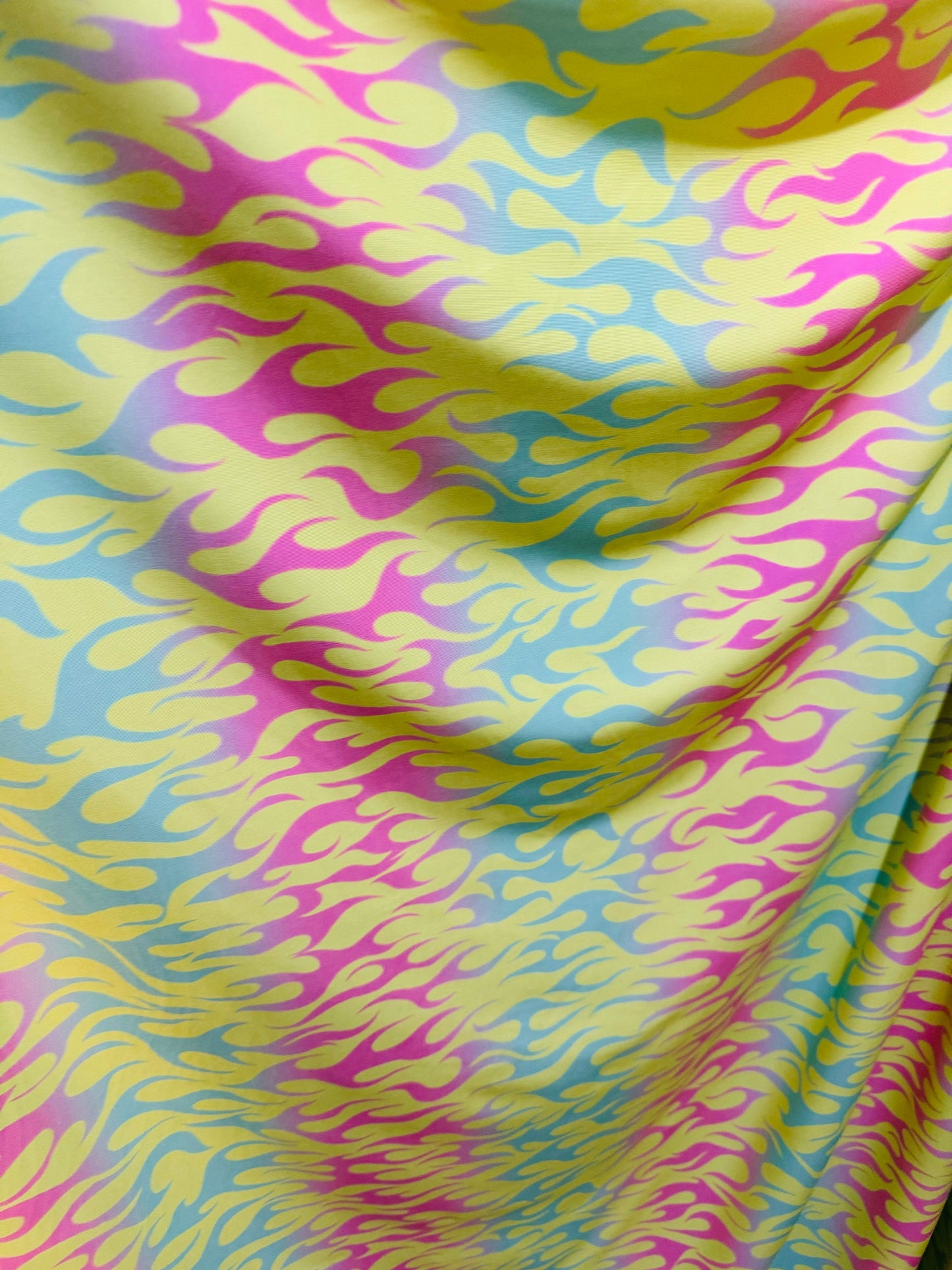 New Flames design Multi Pastel colors print on great quality of poly spandex 4-way stretch 58/60”