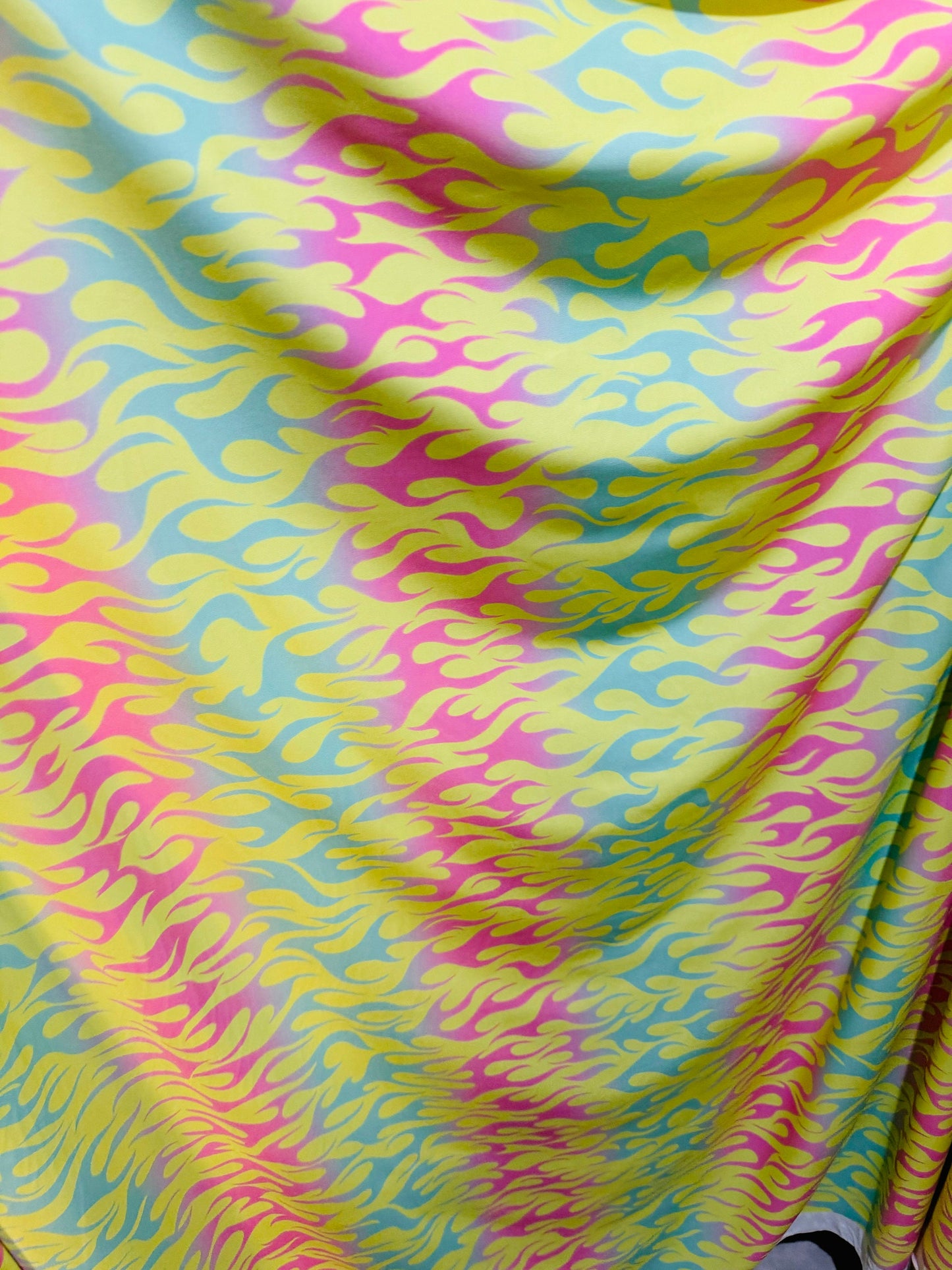 New Flames design Multi Pastel colors print on great quality of poly spandex 4-way stretch 58/60”