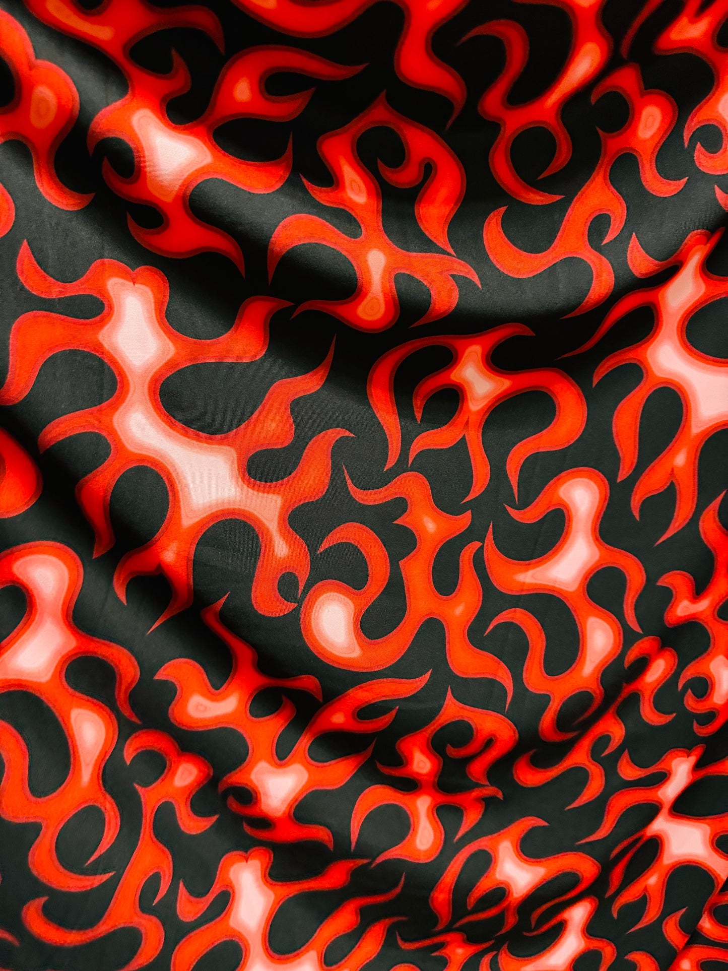 New Flames abstract design Black/Red print on great quality of nylon spandex 4-way stretch 58/60”