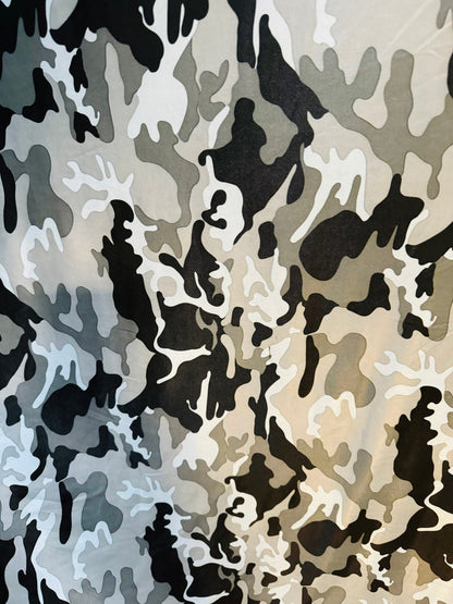 Camouflage design Gray/silver/black print on poly spandex 2-way stretch 58/60”