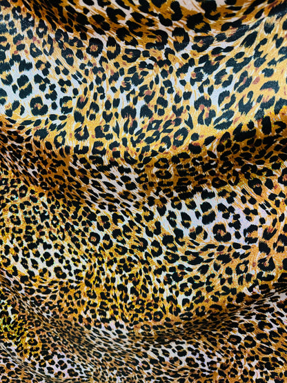 New Exotic Leopard design hologram metallic nylon spandex with foggy foil 4-way stretch 58/60”