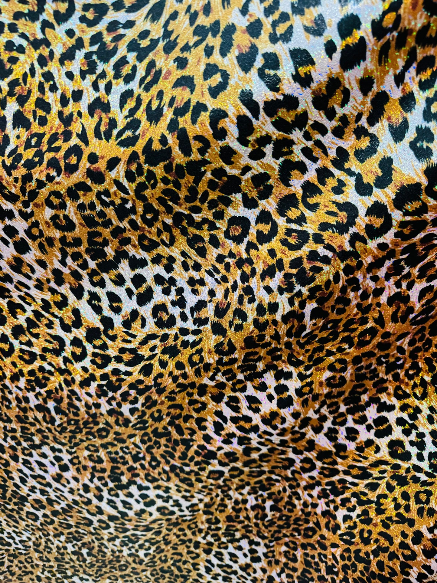 New Exotic Leopard design hologram metallic nylon spandex with foggy foil 4-way stretch 58/60”