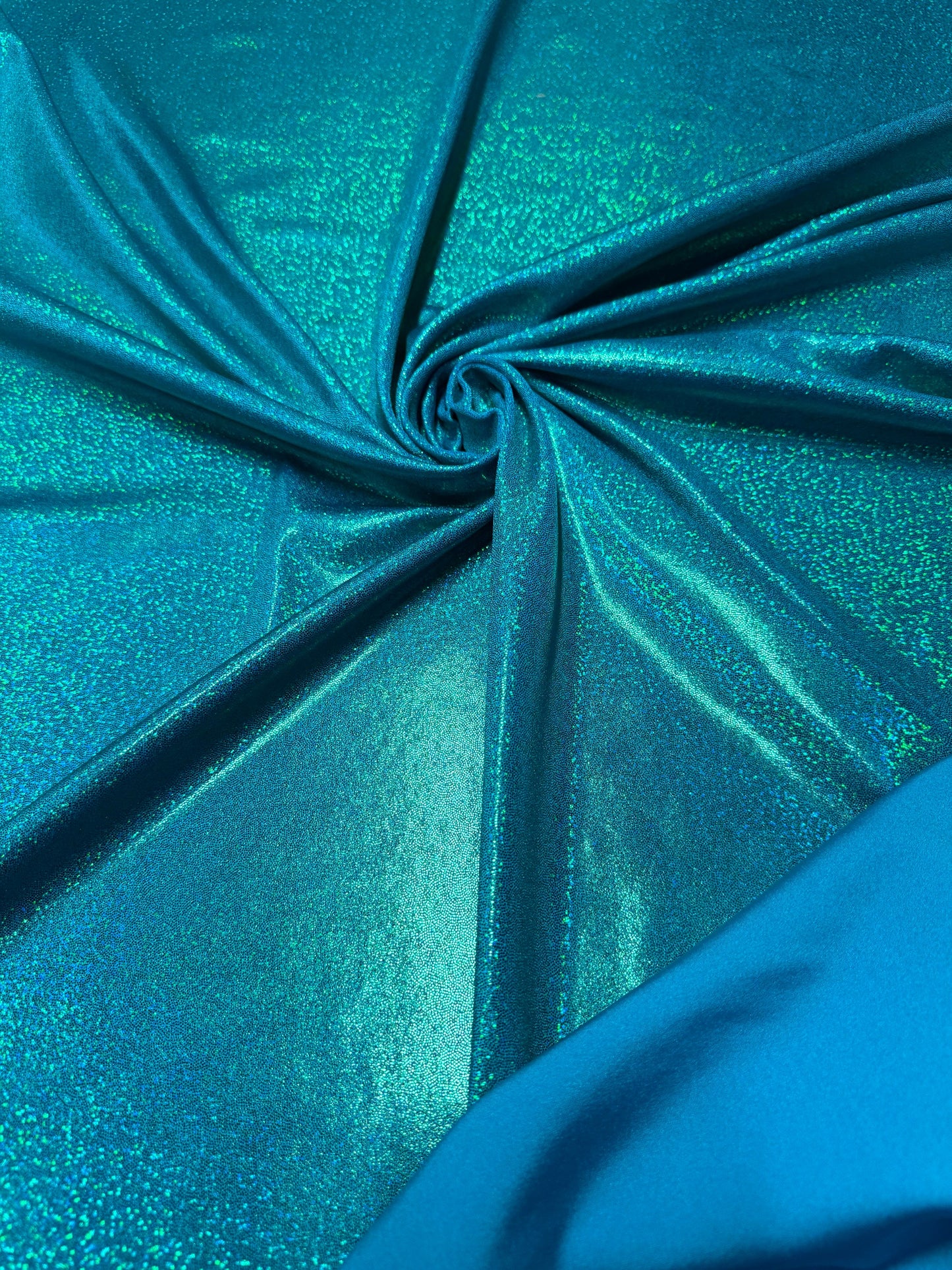 Ocean/green hologram metallic foggy foil metallic nylon spandex 4-way stretch 58/60”