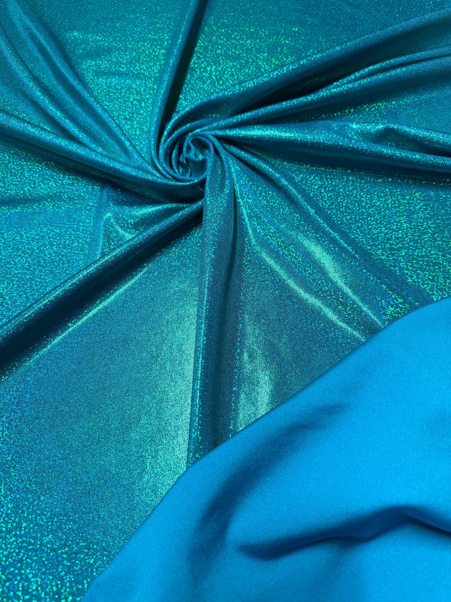 Ocean/green hologram metallic foggy foil metallic nylon spandex 4-way stretch 58/60”