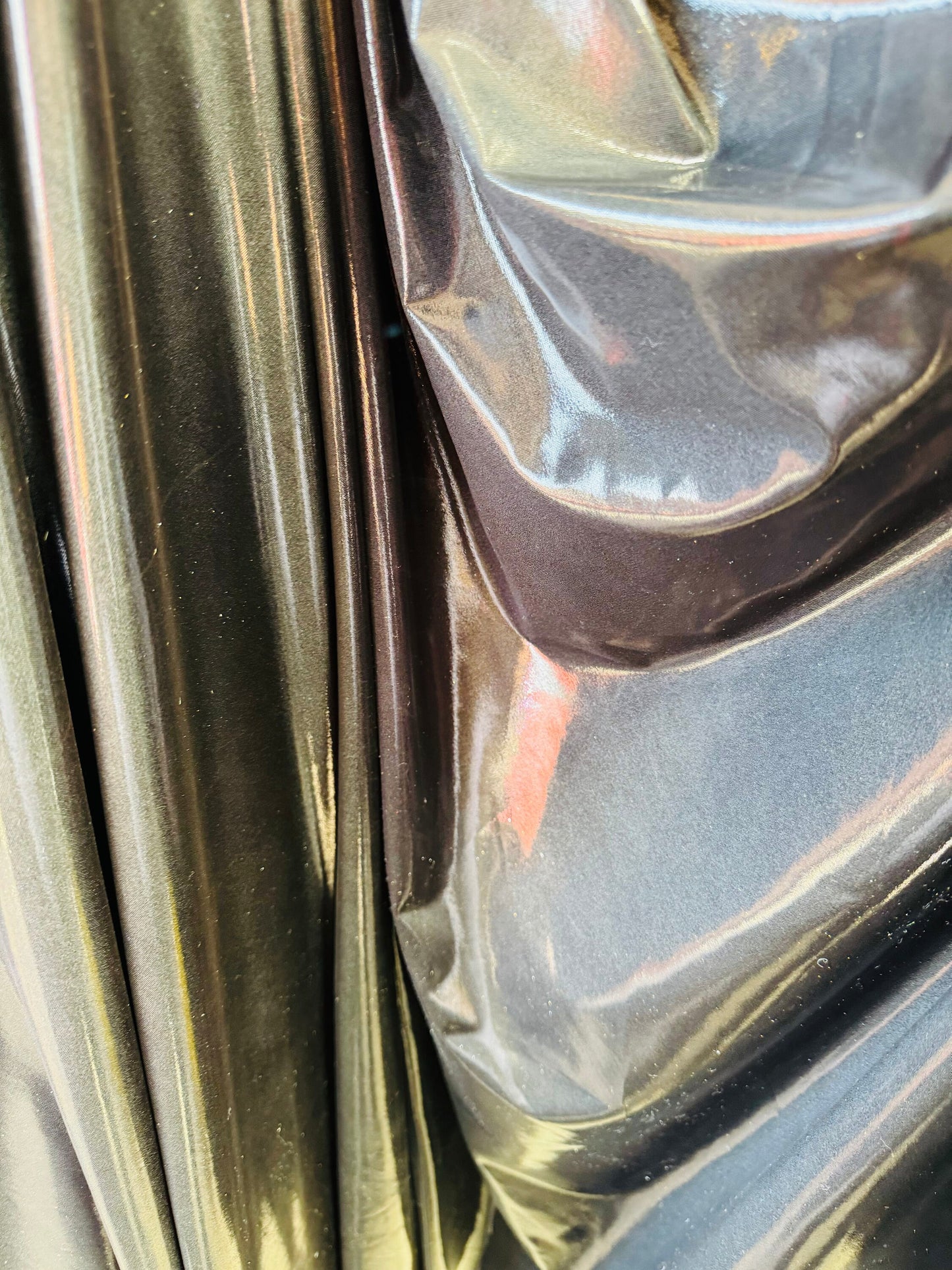 Super shiny all over foil metallic spandex 4-way stretch 58/60” Sold by the YD. Ships worldwide from Los Angeles California USA