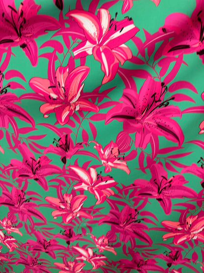 New flower design pink/green print on great quality of poly spandex 4-way stretch 58/60” Sold by the YD.