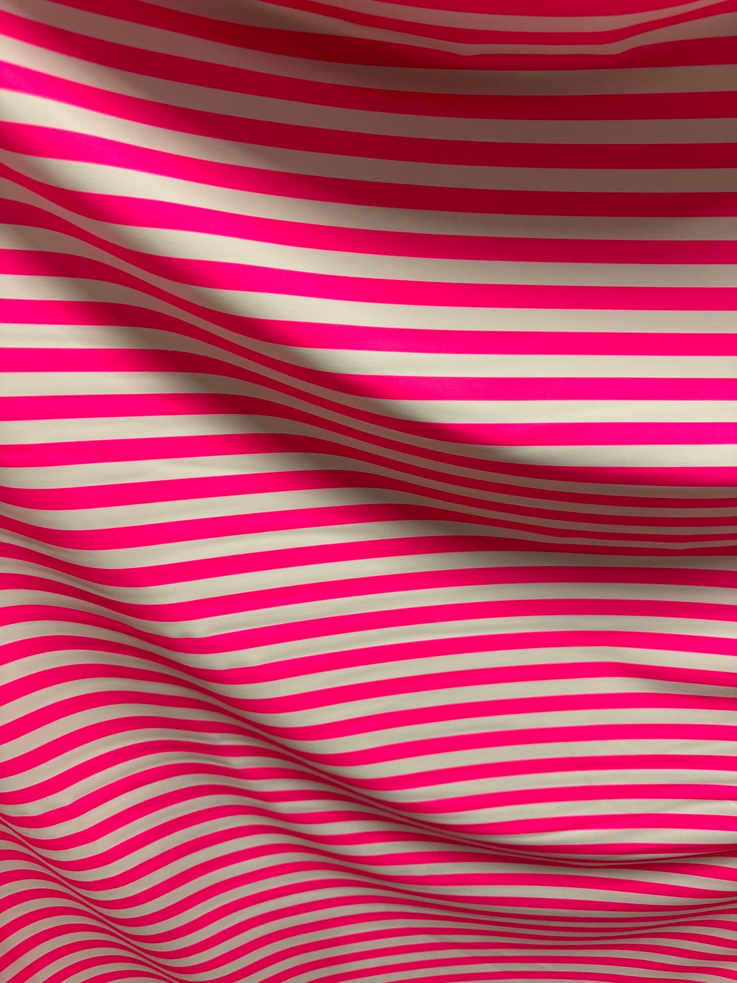 Stripe design 1/2” size neon pink/white print on best quality of nylon spandex 4-way stretch 58/60”