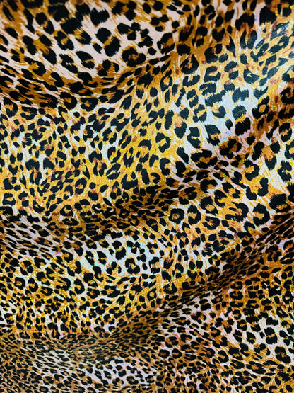 New Exotic Leopard design hologram metallic nylon spandex with foggy foil 4-way stretch 58/60”