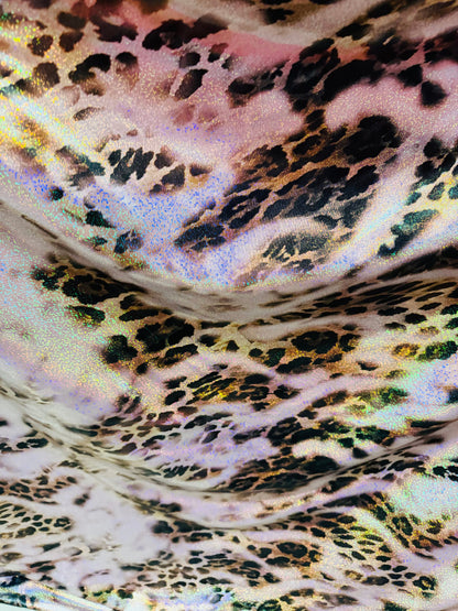 New Hiding Leopard design on metallic nylon spandex with hologram foil 4-way stretch 58/60” High quality fabrics by AlexLAFabrics