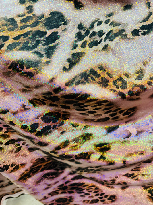 New Hiding Leopard design on metallic nylon spandex with hologram foil 4-way stretch 58/60” High quality fabrics by AlexLAFabrics