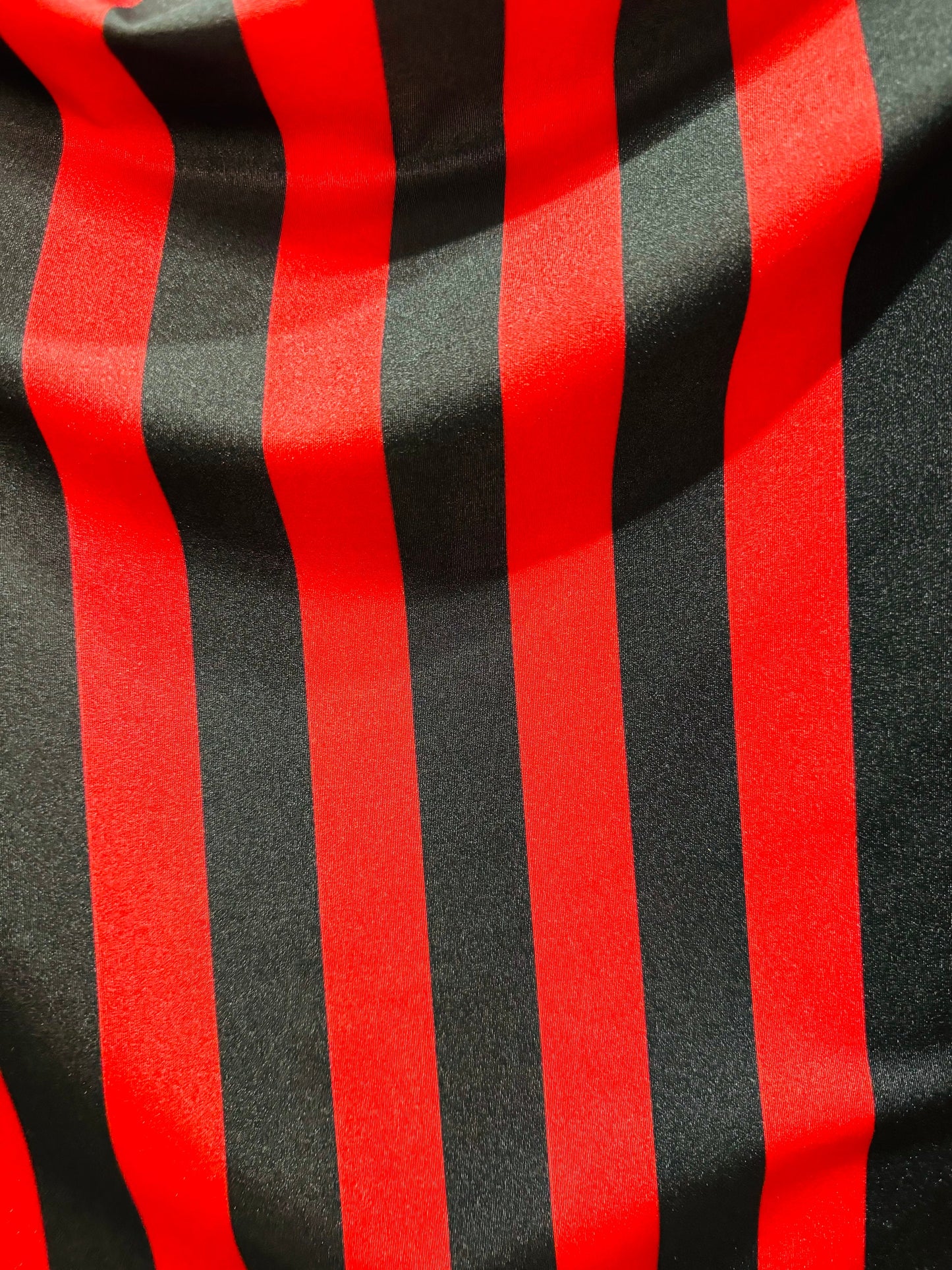 Stripes design red/black 1” print on best quality of nylon spandex 4-way stretch 58/60”