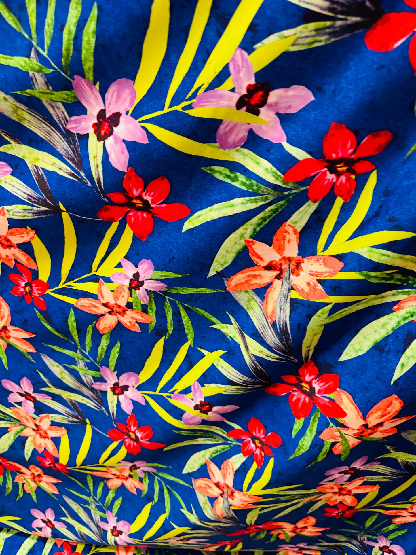 Hawaiian flower design sapphire/multi print on great quality of nylon spandex 4-way stretch 58/60”