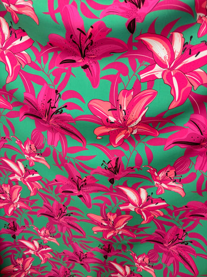 New flower design pink/green print on great quality of poly spandex 4-way stretch 58/60” Sold by the YD.